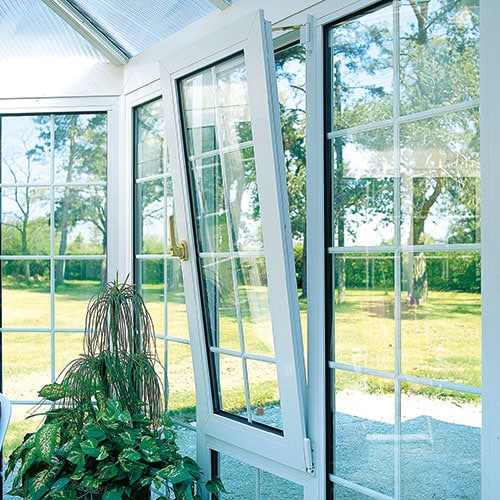 White UPVC Georgian Bar Tilt andTurn Windows Installed in Conservatory by Andrew Wright Windows, Ayrshire